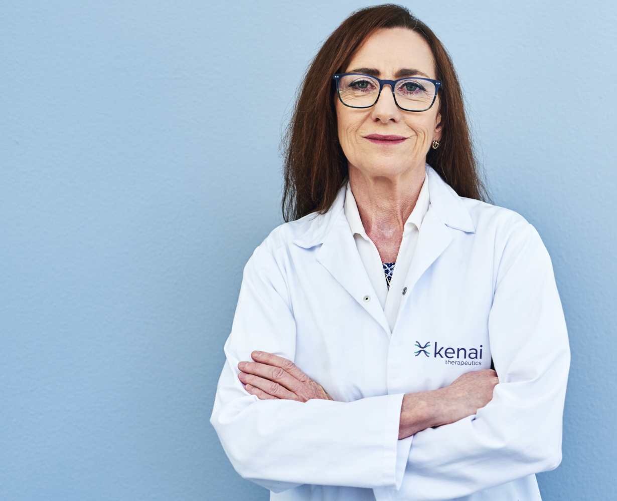 Kenai Therapeutics scientist in branded lab coat.